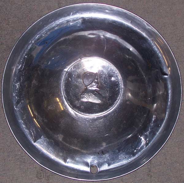 53 Chrysler hubcap #2